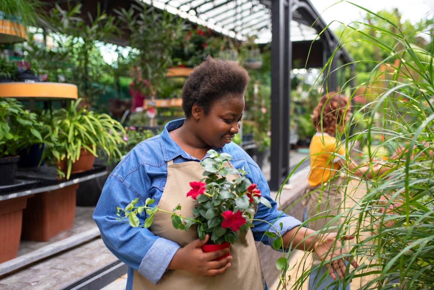 Black woman running an independent plant business